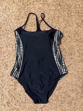 Catalina Black Racerback One-Piece with White polka dots and a snatched look